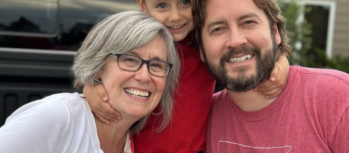 Photo of me with my son and grandson